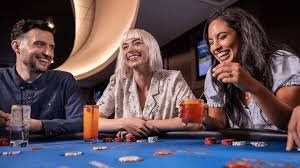 arisan Draw Schedule calendar showing live-dealer table times, sportsbook events, and esports tournaments